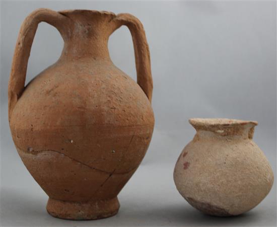 A Roman terracotta amphora and a Roman redware globular vase, c.2nd century AD, 24cm and 11cm